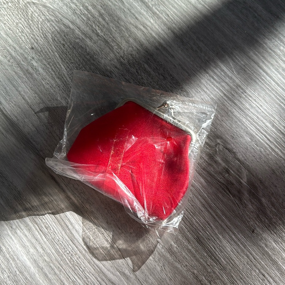 Red snap change purse with silver trim